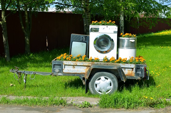 Trailer With Home Appliances. Tv And Washing Machine