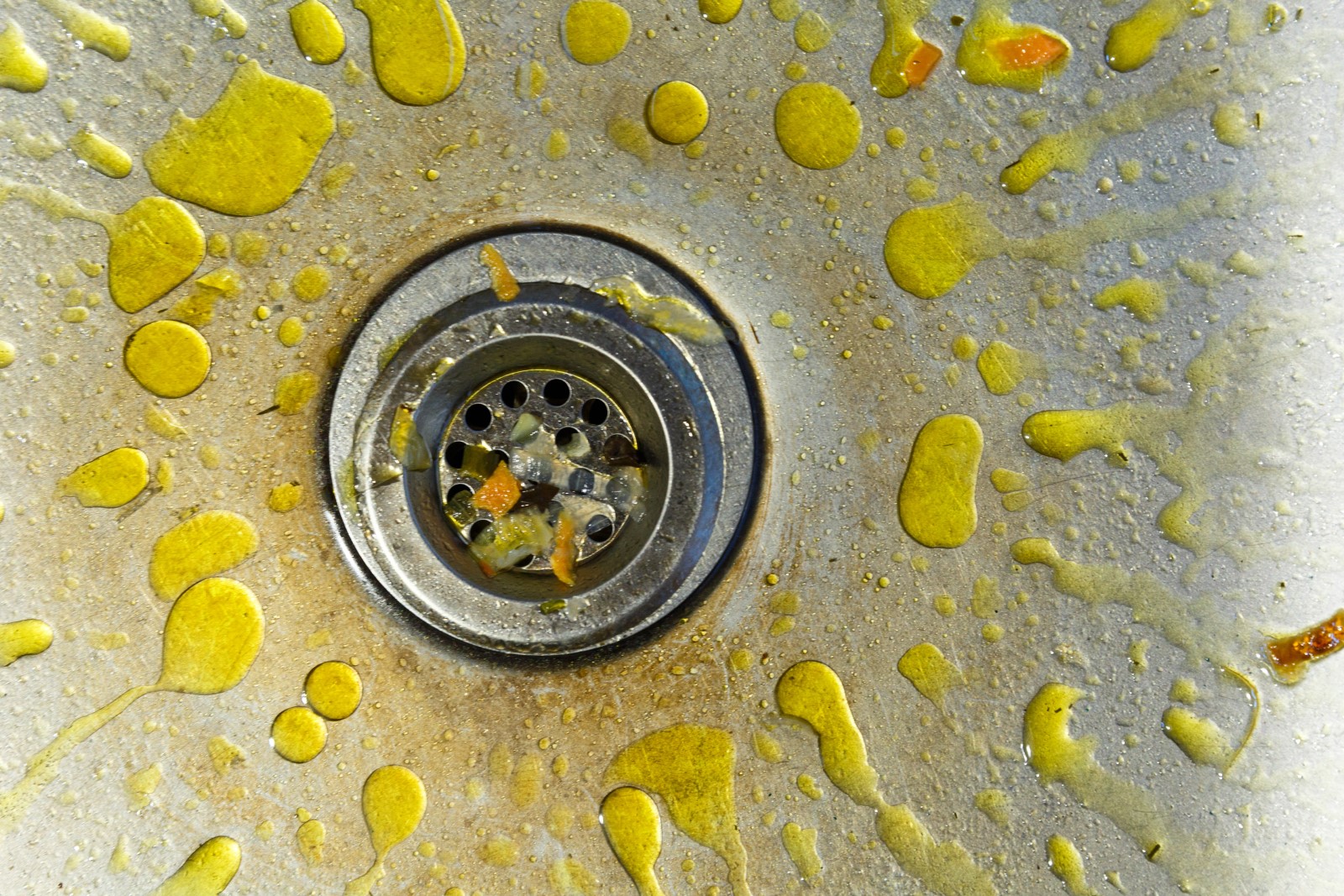 Yellow grease in a kitchen sink is an example of what not to put down a garbage disposal.